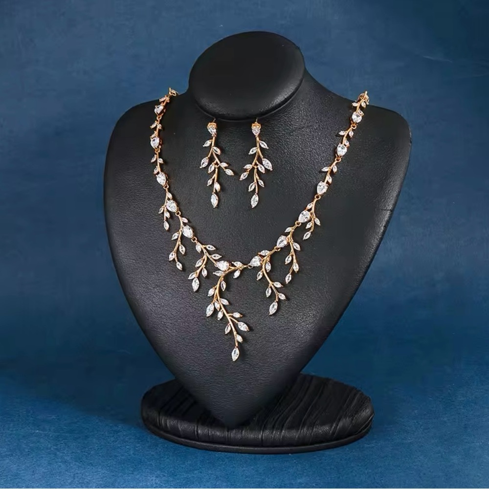 Wedding / bridal / formal rose gold colored necklace set with cubic zirconia.